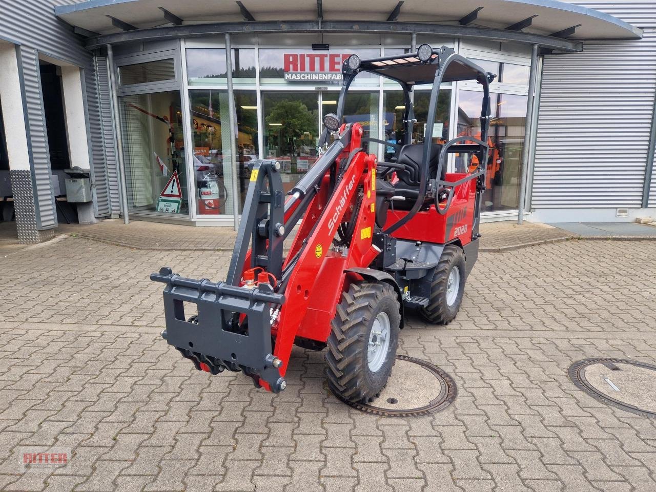 Radlader του τύπου Schäffer 2028-2, Neumaschine σε Zell a. H. (Φωτογραφία 1)