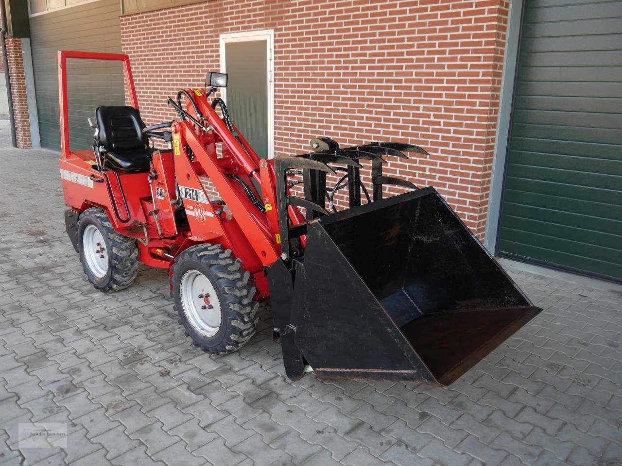 Radlader des Typs Schäffer 214 / 2 nur 1812 Std., Gebrauchtmaschine in Borken (Bild 2)