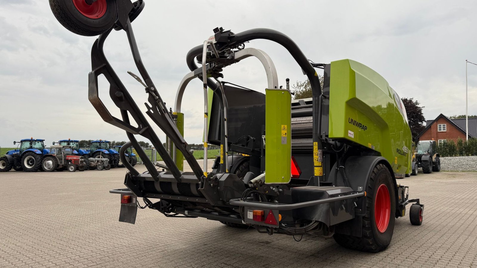 Rundballenpresse Türe ait CLAAS ROLLANT 455 RC UNIWRAP, Gebrauchtmaschine içinde Gjerlev J. (resim 5)