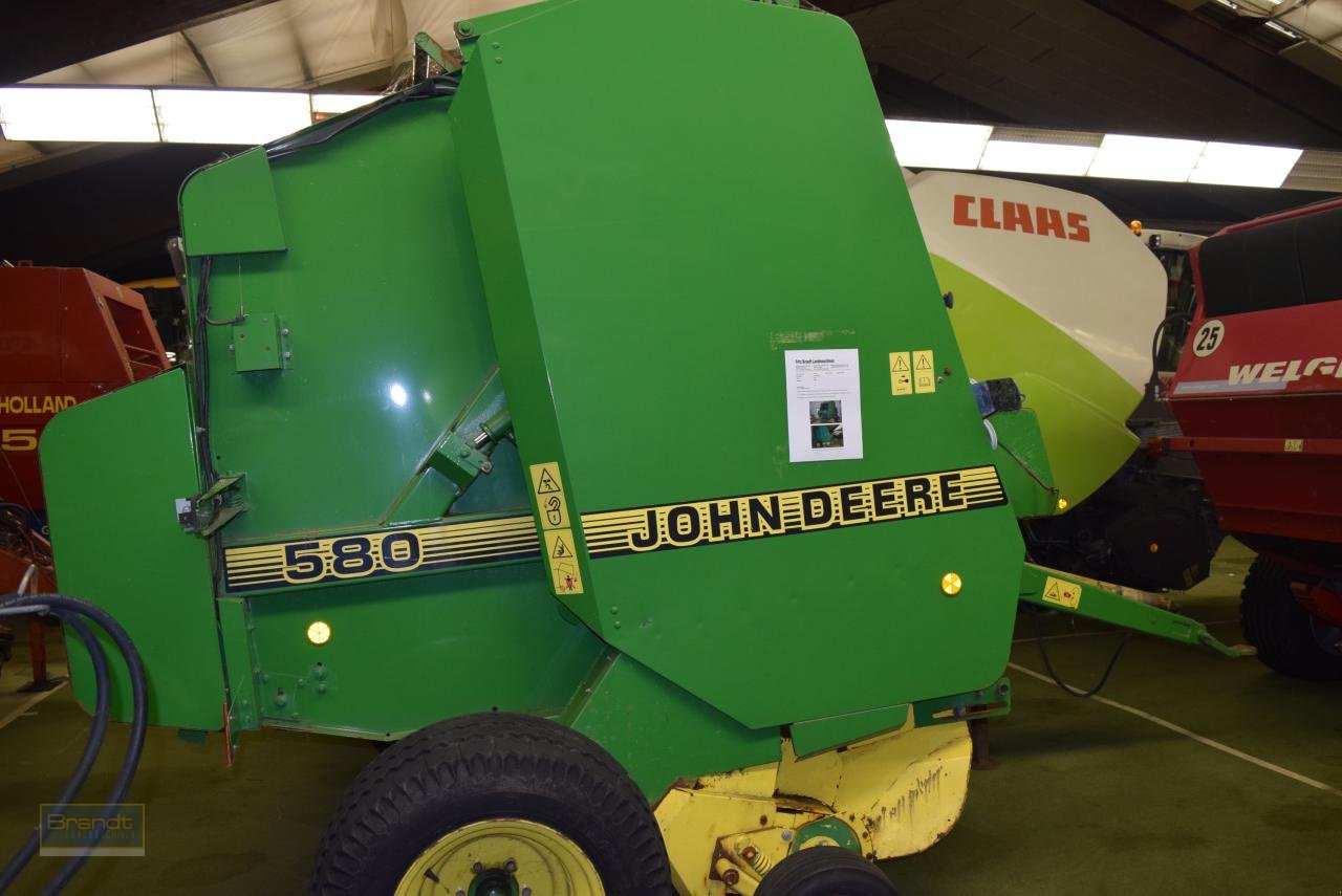 Rundballenpresse типа John Deere 580, Gebrauchtmaschine в Oyten (Фотография 1)