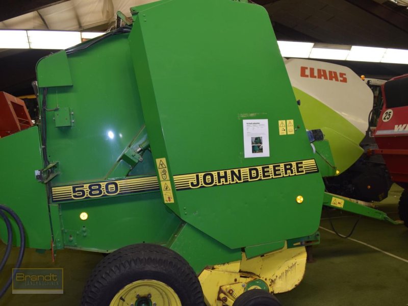 Rundballenpresse типа John Deere 580, Gebrauchtmaschine в Oyten (Фотография 1)