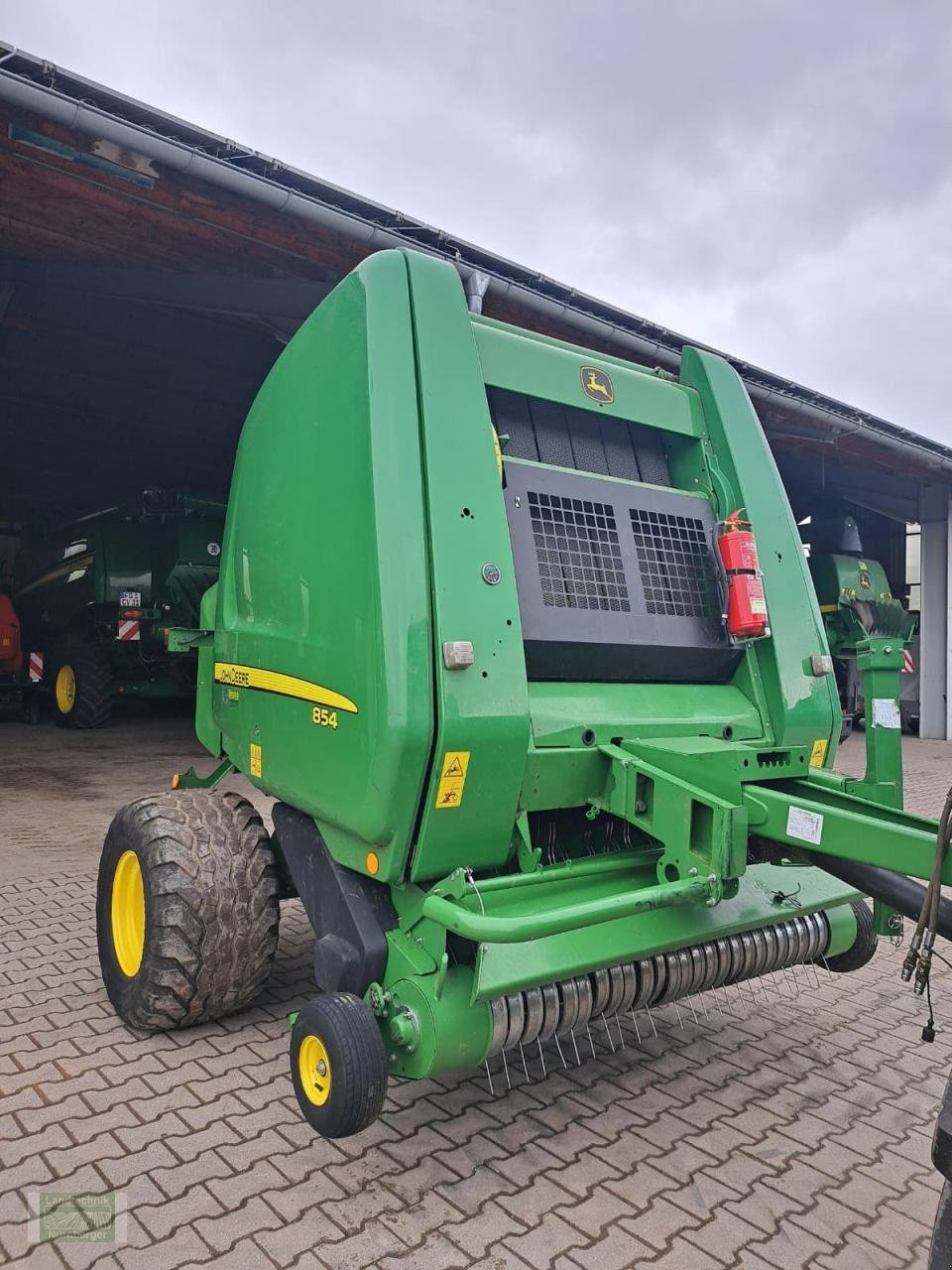 Rundballenpresse des Typs John Deere 854 Premium MaxiCut, Gebrauchtmaschine in Leubsdorf (Bild 1)