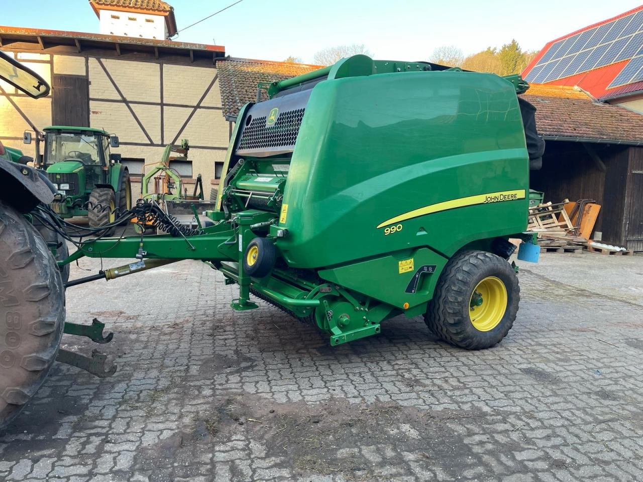 Rundballenpresse des Typs John Deere 990 Premium, Gebrauchtmaschine in Zweibrücken (Bild 1)