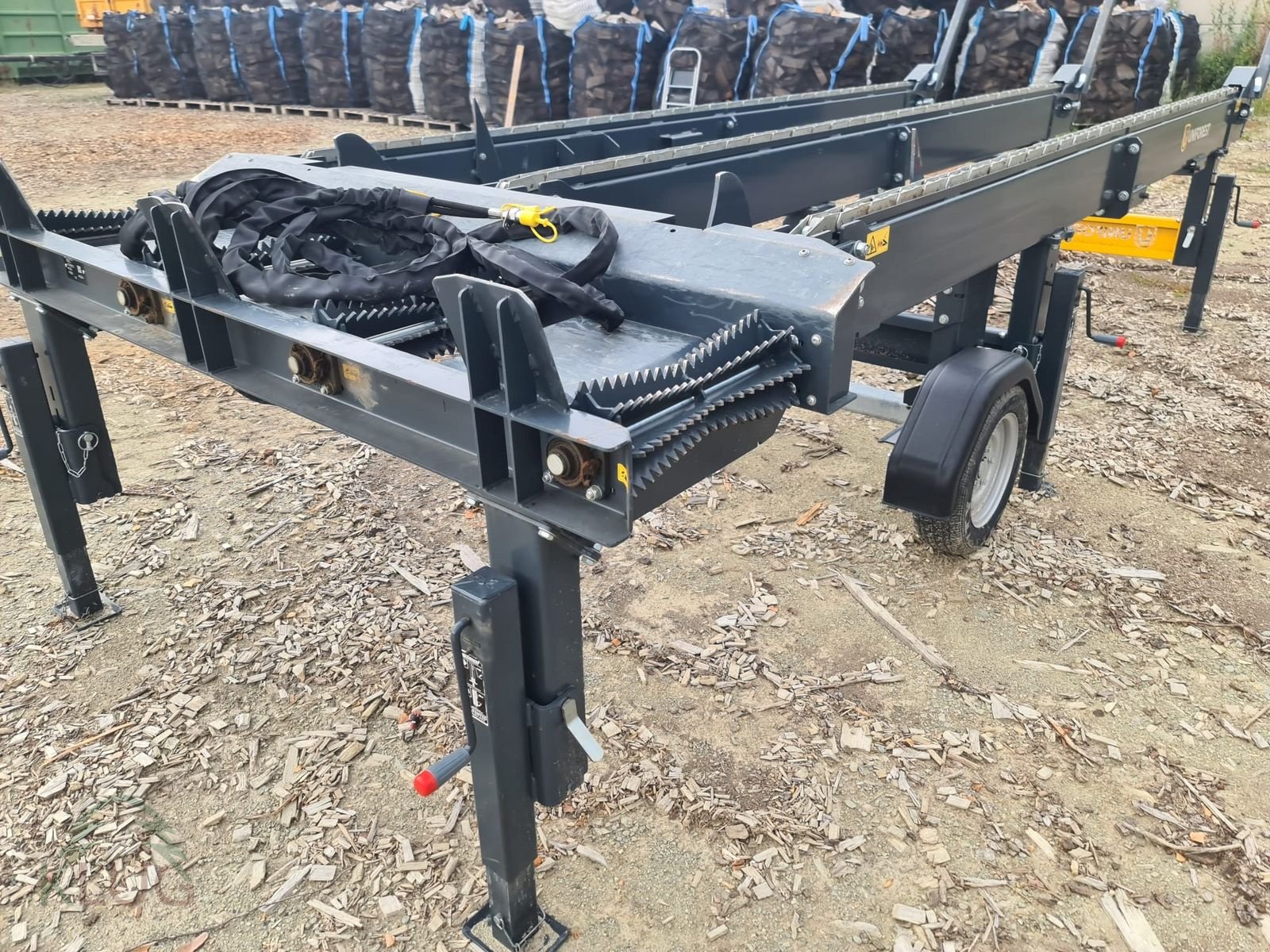 Sägeautomat & Spaltautomat Türe ait Uniforest DM 4000/3 TR H Querförderer, Gebrauchtmaschine içinde Pirching am Traubenberg (resim 7)