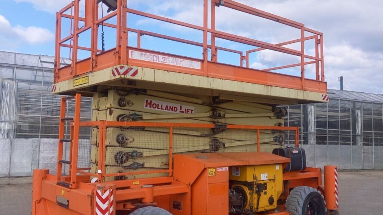 Scherenarbeitsbühne tipa Holland Lift B-195DL25 -4WD /P/N, Gebrauchtmaschine u Rødovre (Slika 1)