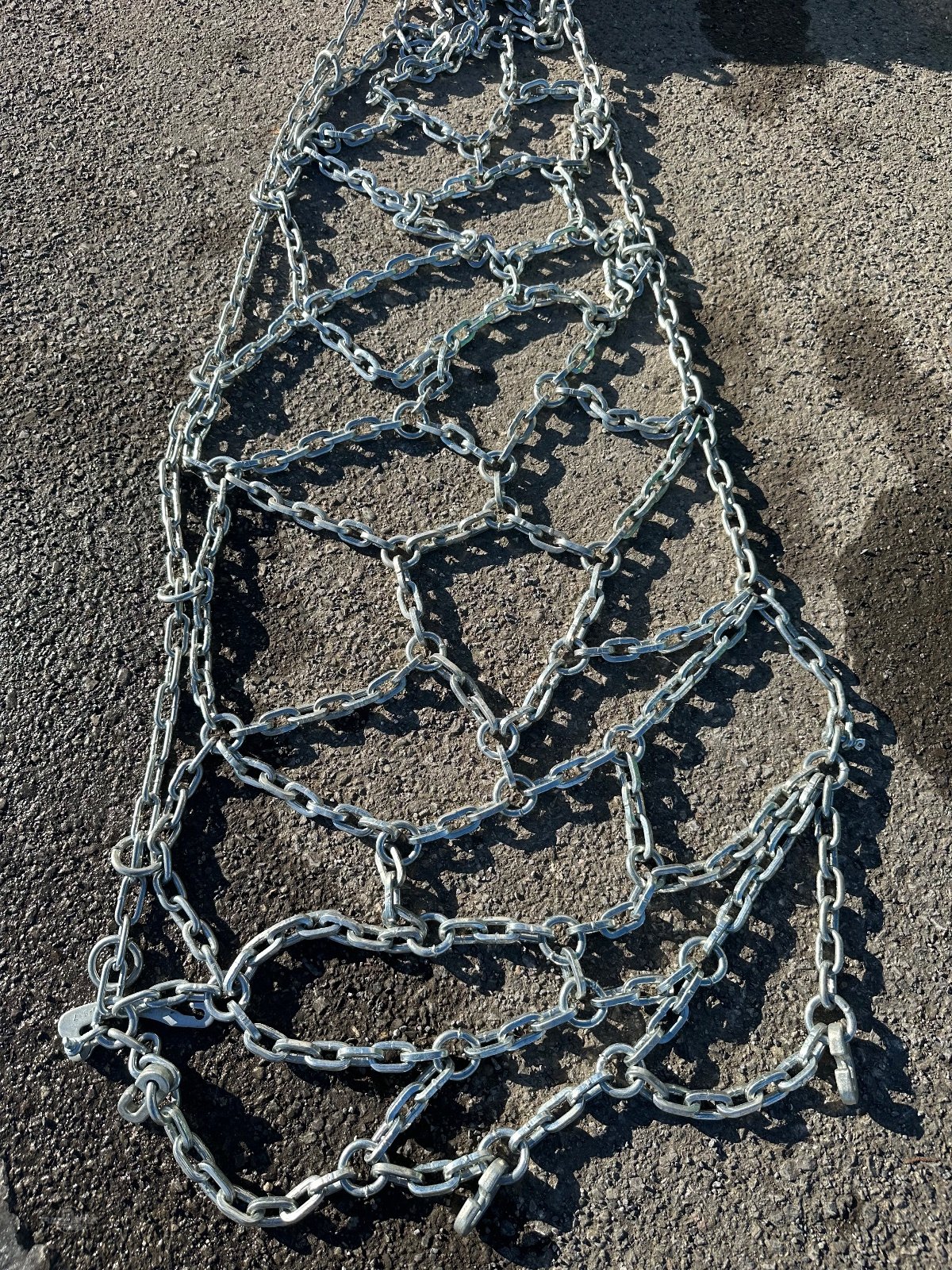 Schneekette of the type Ottinger Netzkette Netz E 440/65R24 (440/65-24) 8 mm, Neumaschine in Rankweil (Picture 1)