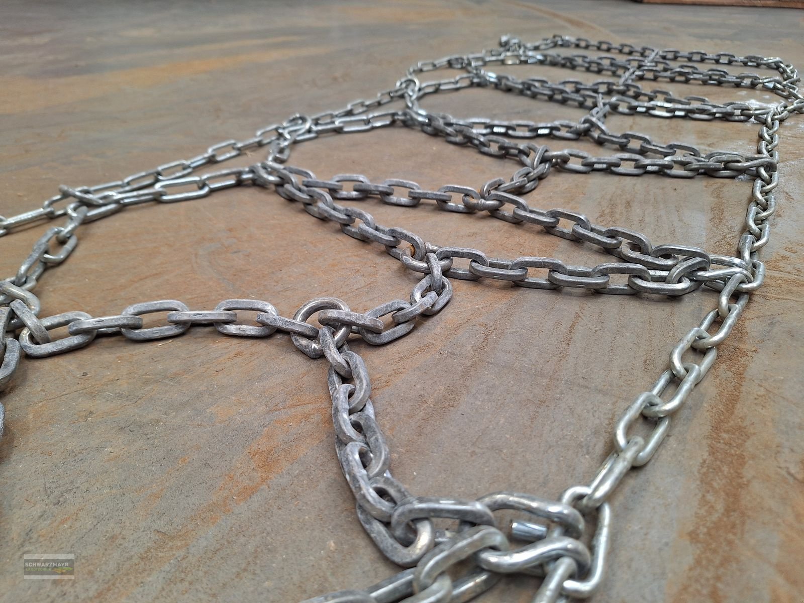 Schneekette des Typs Pewag 11.5/80-15.3, Gebrauchtmaschine in Gampern (Bild 10)