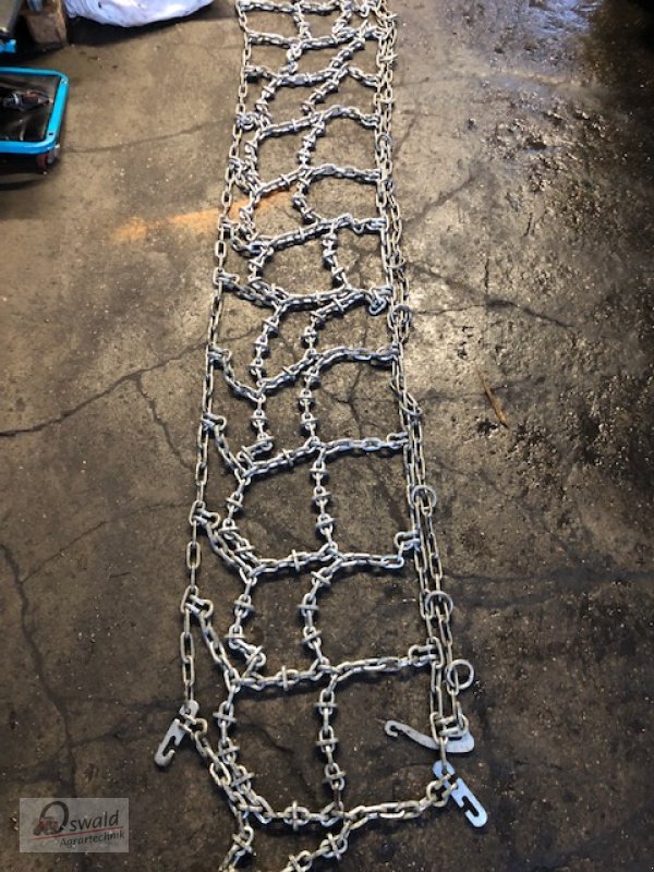 Schneekette des Typs Pewag Schneeketten, Neumaschine in Regen (Bild 1)