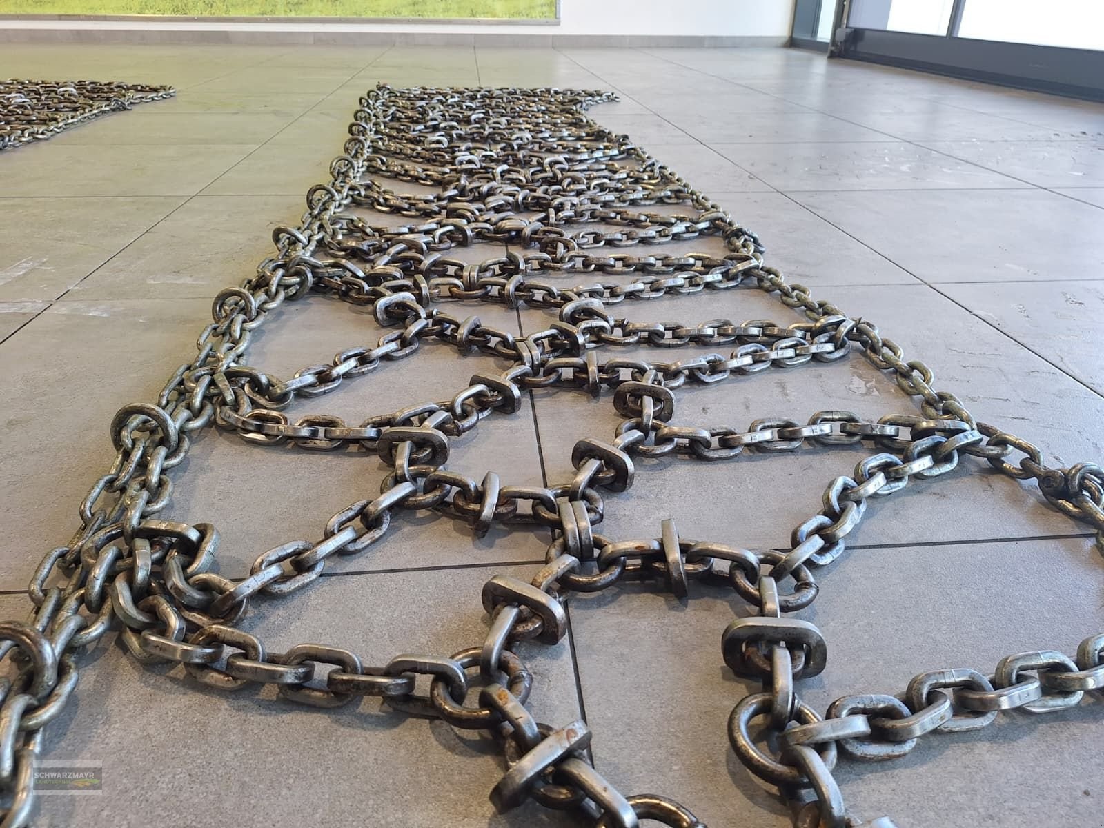 Schneekette of the type Rex 540/65R30 ATS886100 verstärkte Netzketten, Gebrauchtmaschine in Gampern (Picture 12)