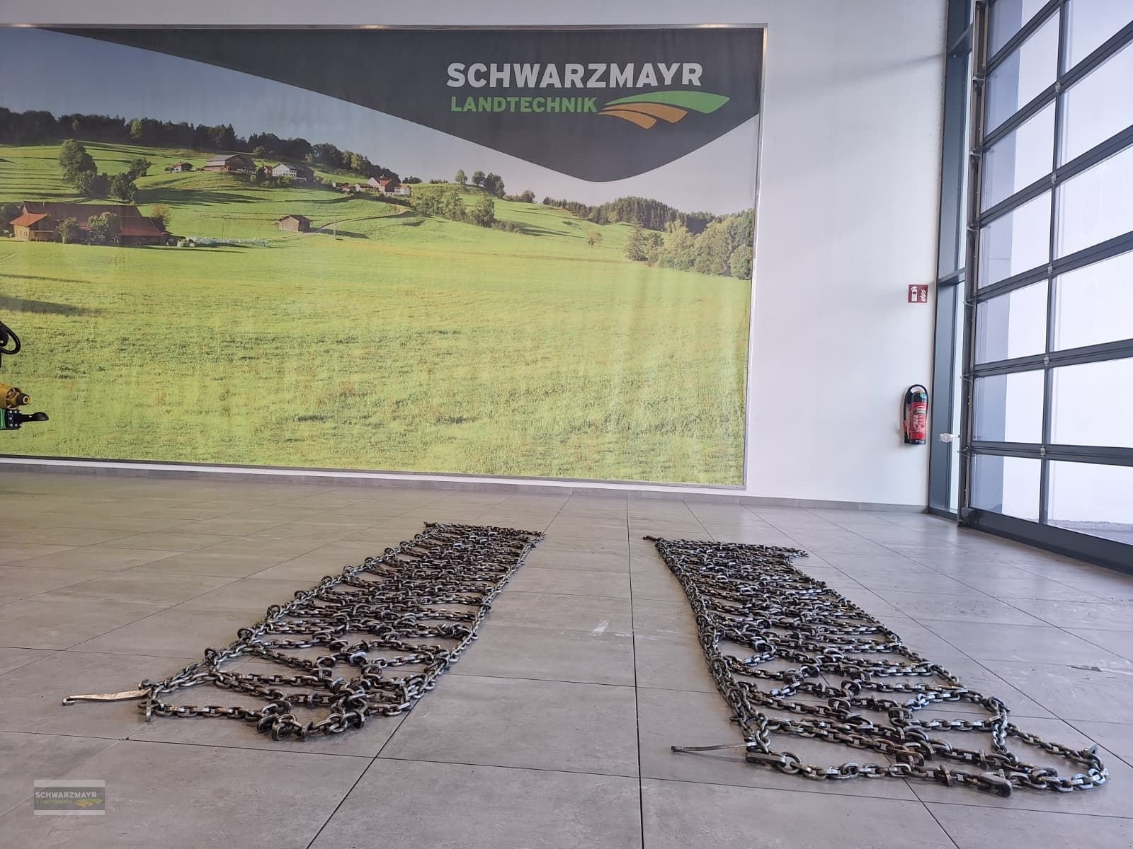 Schneekette of the type Rex 540/65R30 ATS886100 verstärkte Netzketten, Gebrauchtmaschine in Gampern (Picture 1)