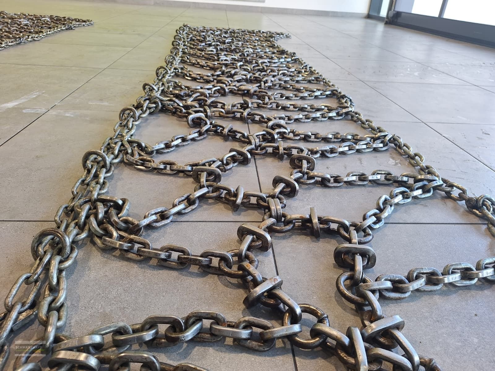 Schneekette of the type Rex 540/65R30 ATS886100 verstärkte Netzketten, Gebrauchtmaschine in Gampern (Picture 11)