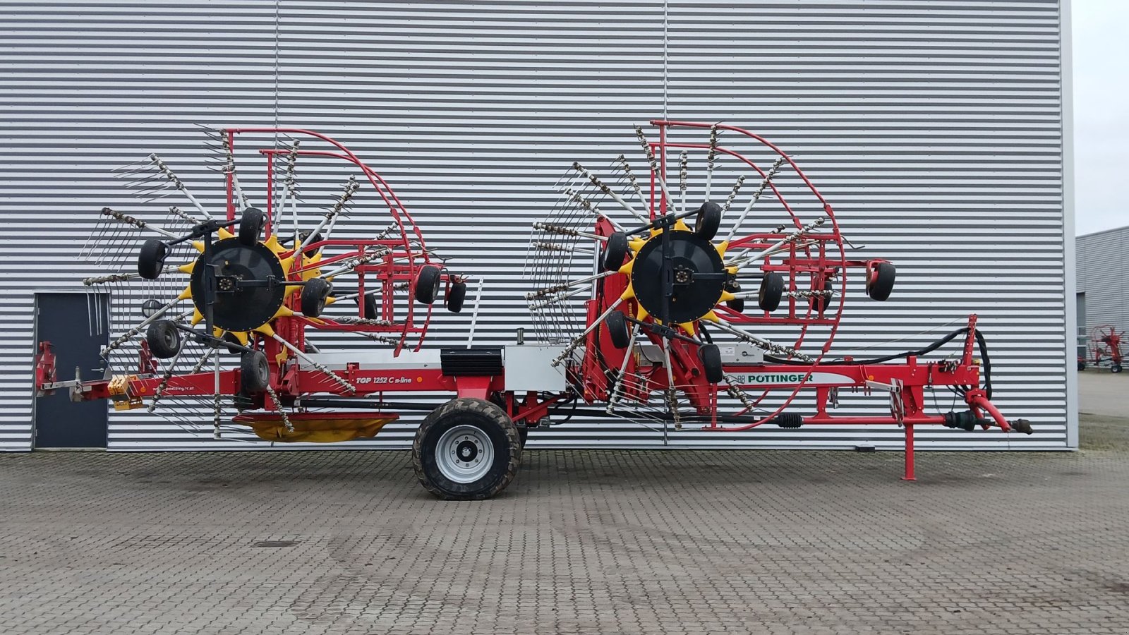 Schwader типа Pöttinger TOP 1252 C s-line, Gebrauchtmaschine в Horsens (Фотография 1)