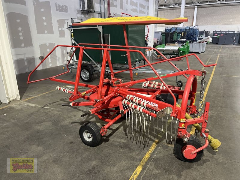 Schwader des Typs Pöttinger TOP 280 U, Gebrauchtmaschine in Kötschach (Bild 1)