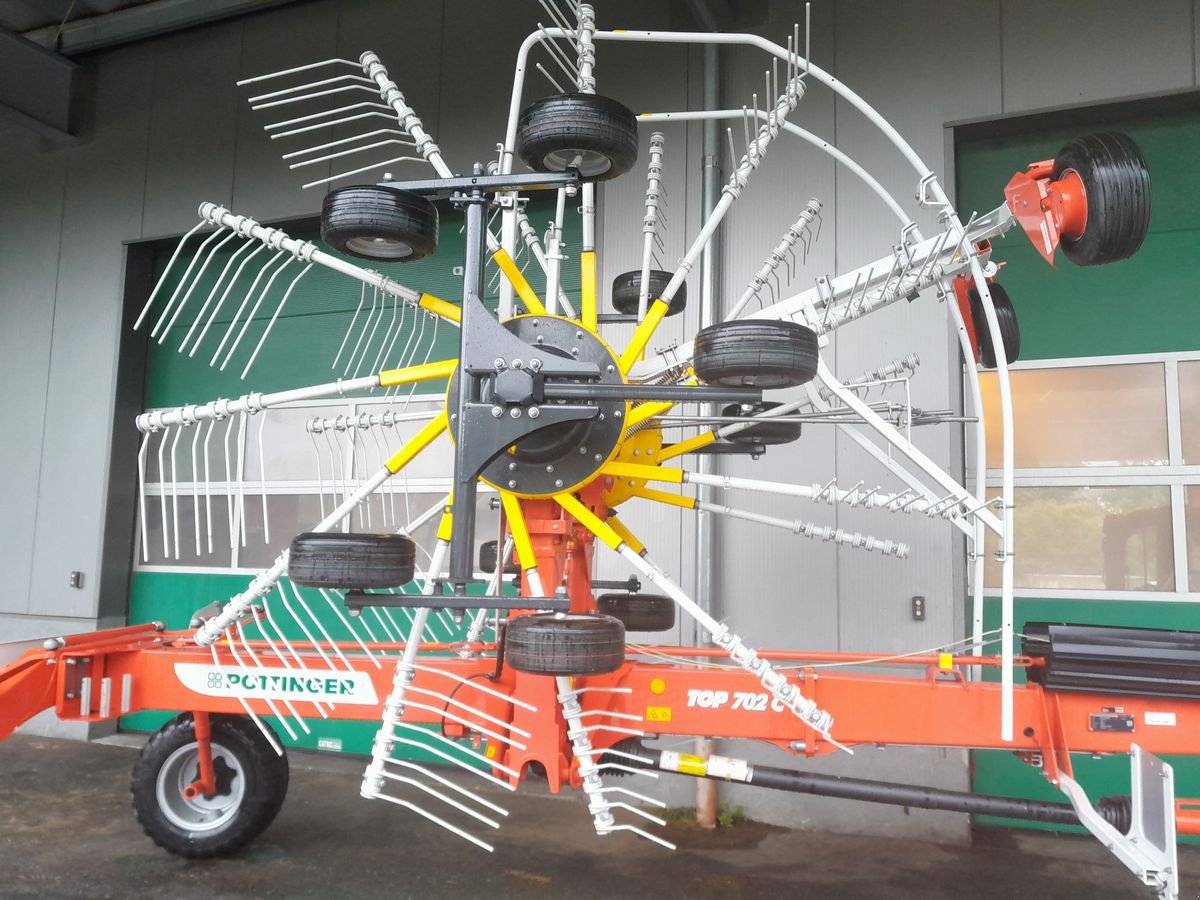 Schwader of the type Pöttinger TOP 702 C, Neumaschine in Bergheim (Picture 9)