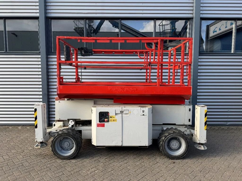 Teleskoparbeitsbühne типа Genie GS2669RT Hoogwerker Schaarhoogwerker Ruwterrein, Gebrauchtmaschine в Hedel (Фотография 1)