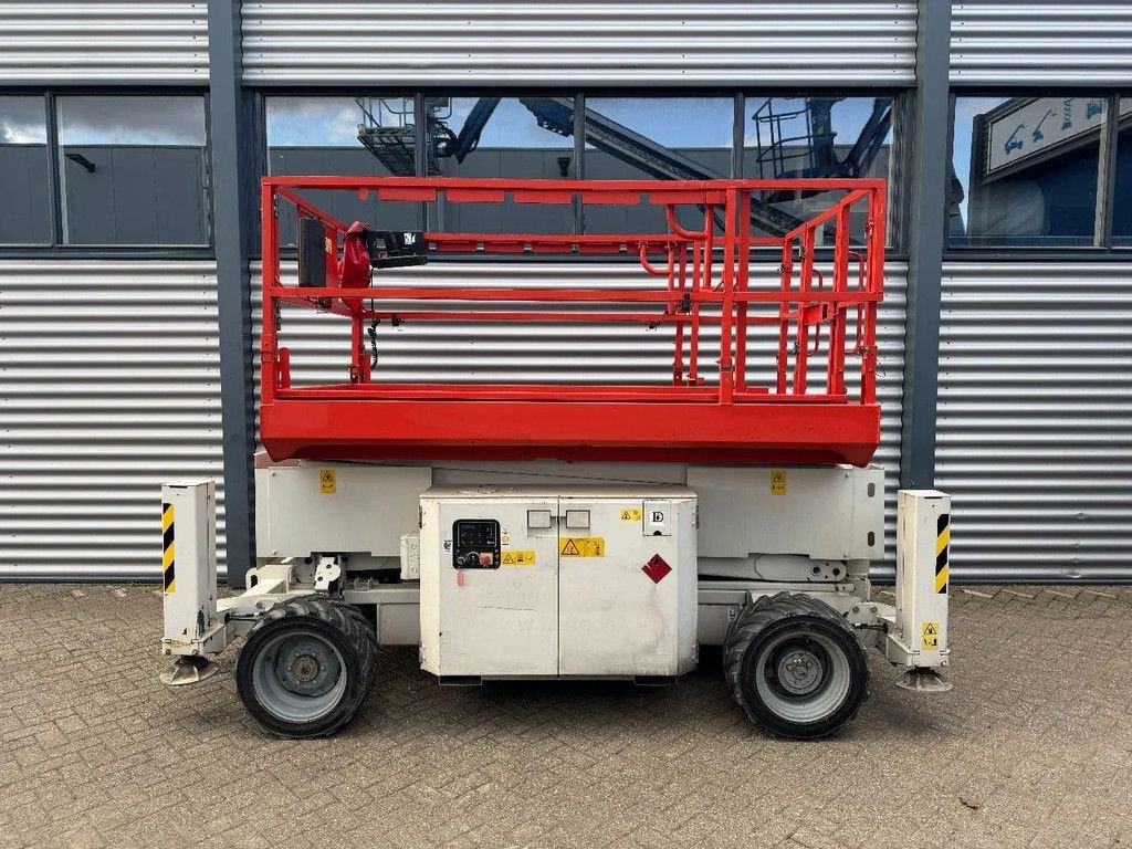 Teleskoparbeitsbühne типа Genie GS3369RT Hoogwerker Schaarhoogwerker Ruwterrein, Gebrauchtmaschine в Hedel (Фотография 1)