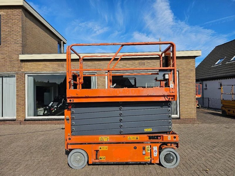 Teleskoparbeitsbühne des Typs Holland Lift Dingeli 14m hoogwerker schaarlift 95 uur, Gebrauchtmaschine in Scherpenzeel (Bild 1)