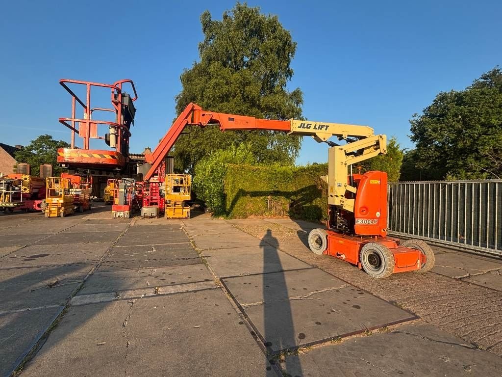 Teleskoparbeitsbühne tipa JLG E300AJP 12m knikarmhoogwerker e300 hoogwerker, Gebrauchtmaschine u Hooge mierde (Slika 7)