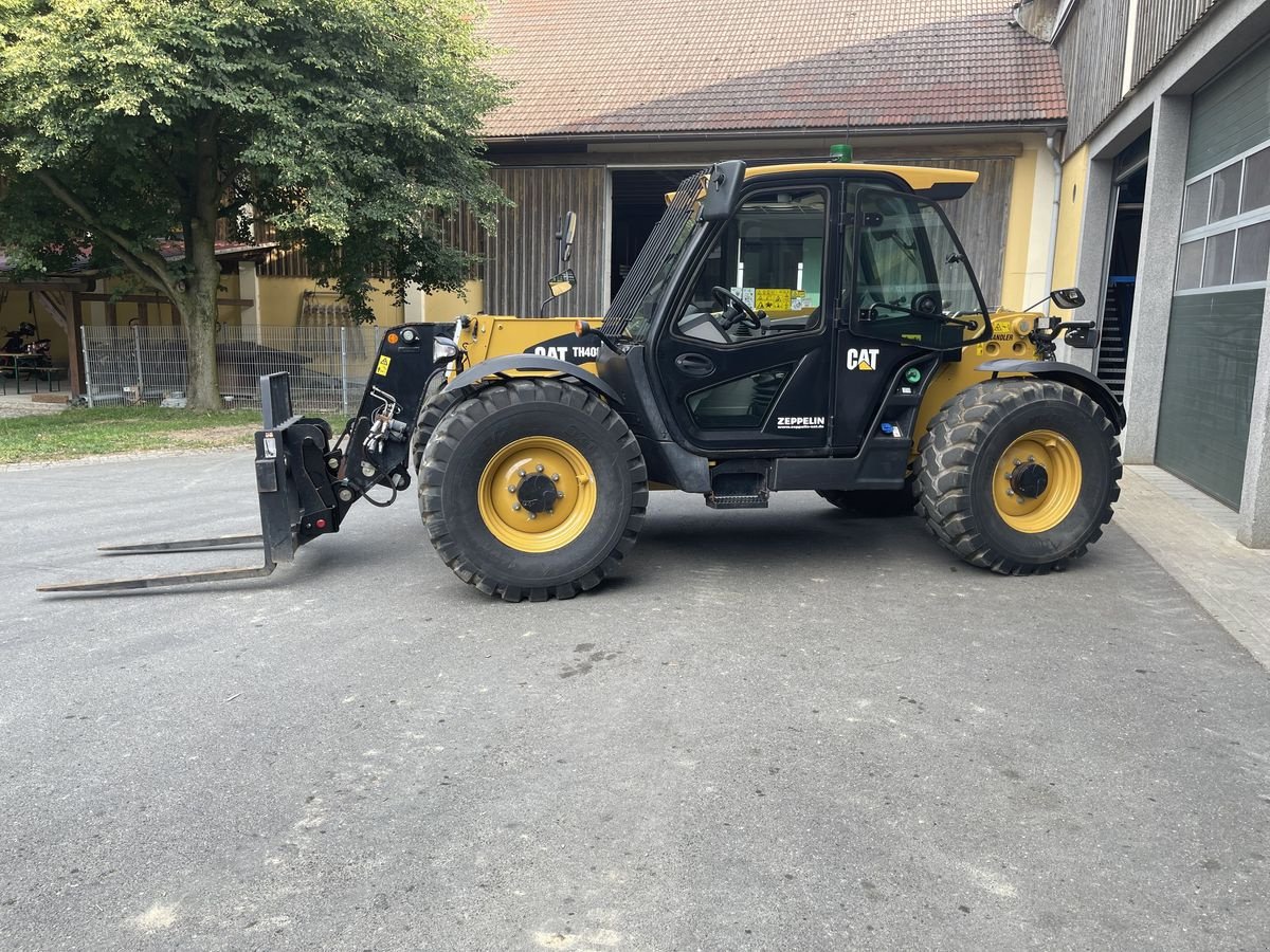 Teleskoplader of the type Caterpillar TH408D, Gebrauchtmaschine in Wolfsbach (Picture 1)