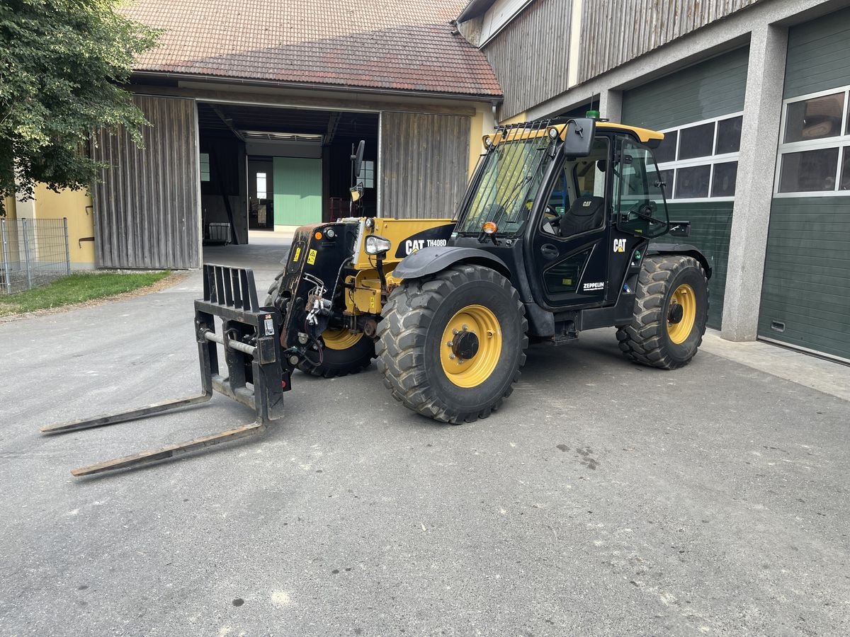 Teleskoplader of the type Caterpillar TH408D, Gebrauchtmaschine in Wolfsbach (Picture 2)