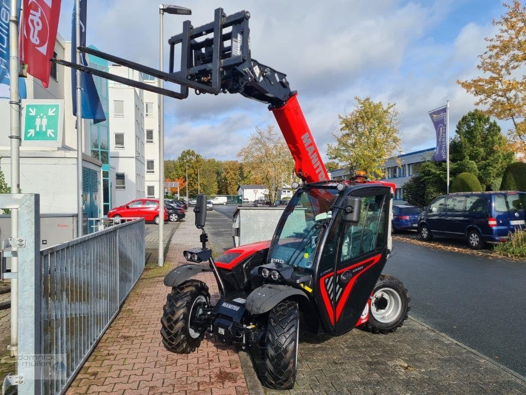 Teleskoplader typu Manitou ULM 415 H Comfort, Gebrauchtmaschine v Friedrichsdorf (Obrázok 2)