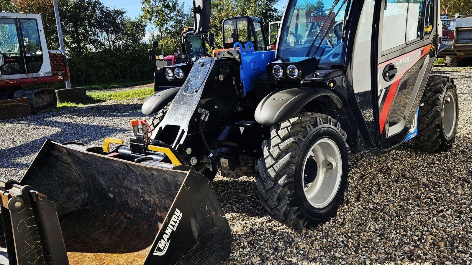 Teleskoplader Türe ait Manitou ULM 415 H / tæt på ny stand / inkl. redskaber / kan køres på trailer, Gebrauchtmaschine içinde Arden (resim 7)