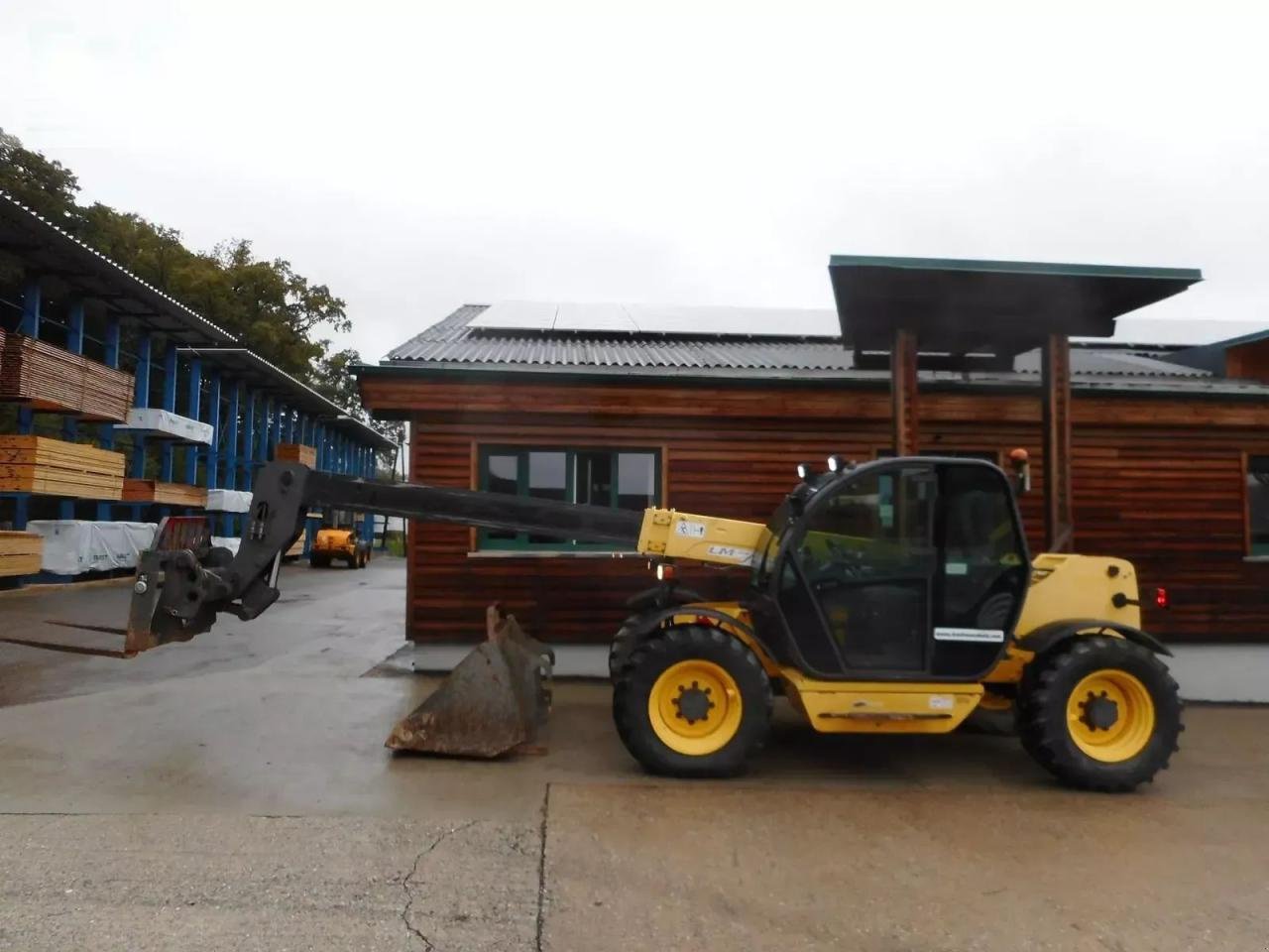 Teleskoplader typu New Holland lm732 mit schaufel und gabel, Gebrauchtmaschine v ST. NIKOLAI/DR. (Obrázek 18)