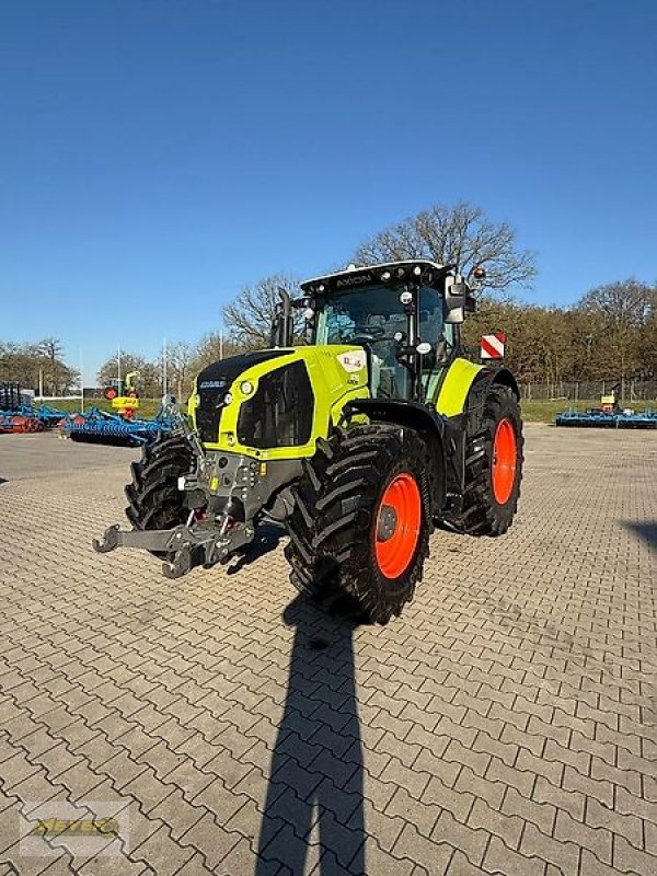 Traktor του τύπου CLAAS Axion 870 CMATIC CEBIS, Neumaschine σε Andervenne (Φωτογραφία 1)