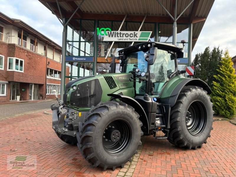 Traktor del tipo CLAAS Axion 870 Cmatic, Neumaschine In Rhede / Brual