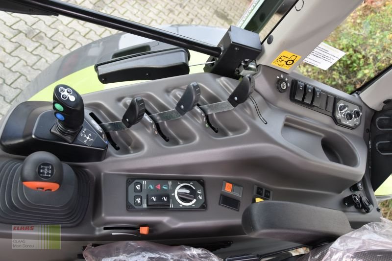 Traktor des Typs CLAAS AXOS  3.105 mit  FL 100 C, Neumaschine in Volkenschwand (Bild 13)