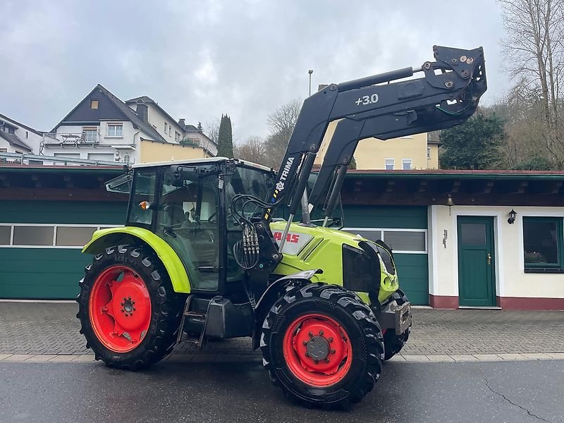 Traktor типа CLAAS AXOS 320 A Allradtraktor Frontlader Druckluft Niedrigkabine ä 310 330 340, Gebrauchtmaschine в Niedernhausen OT Engenhahn (Фотография 2)