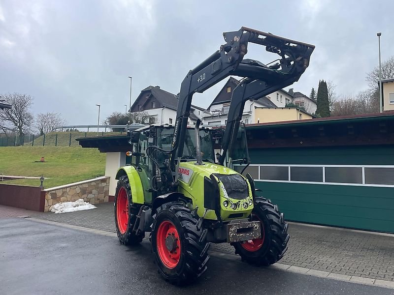 Traktor typu CLAAS AXOS 320 A Allradtraktor Frontlader Druckluft Niedrigkabine ä 310 330 340, Gebrauchtmaschine v Niedernhausen OT Engenhahn (Obrázek 1)