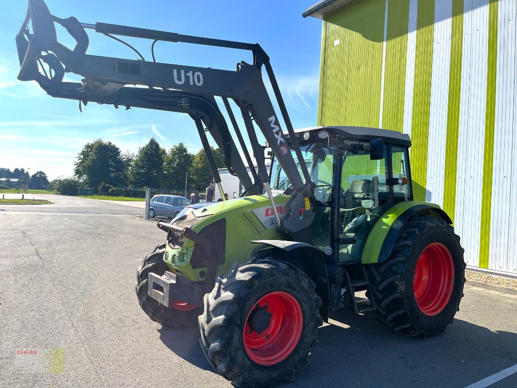 Traktor типа CLAAS AXOS 320 CX, Frontlader MX U10, Gebrauchtmaschine в Westerstede (Фотография 1)
