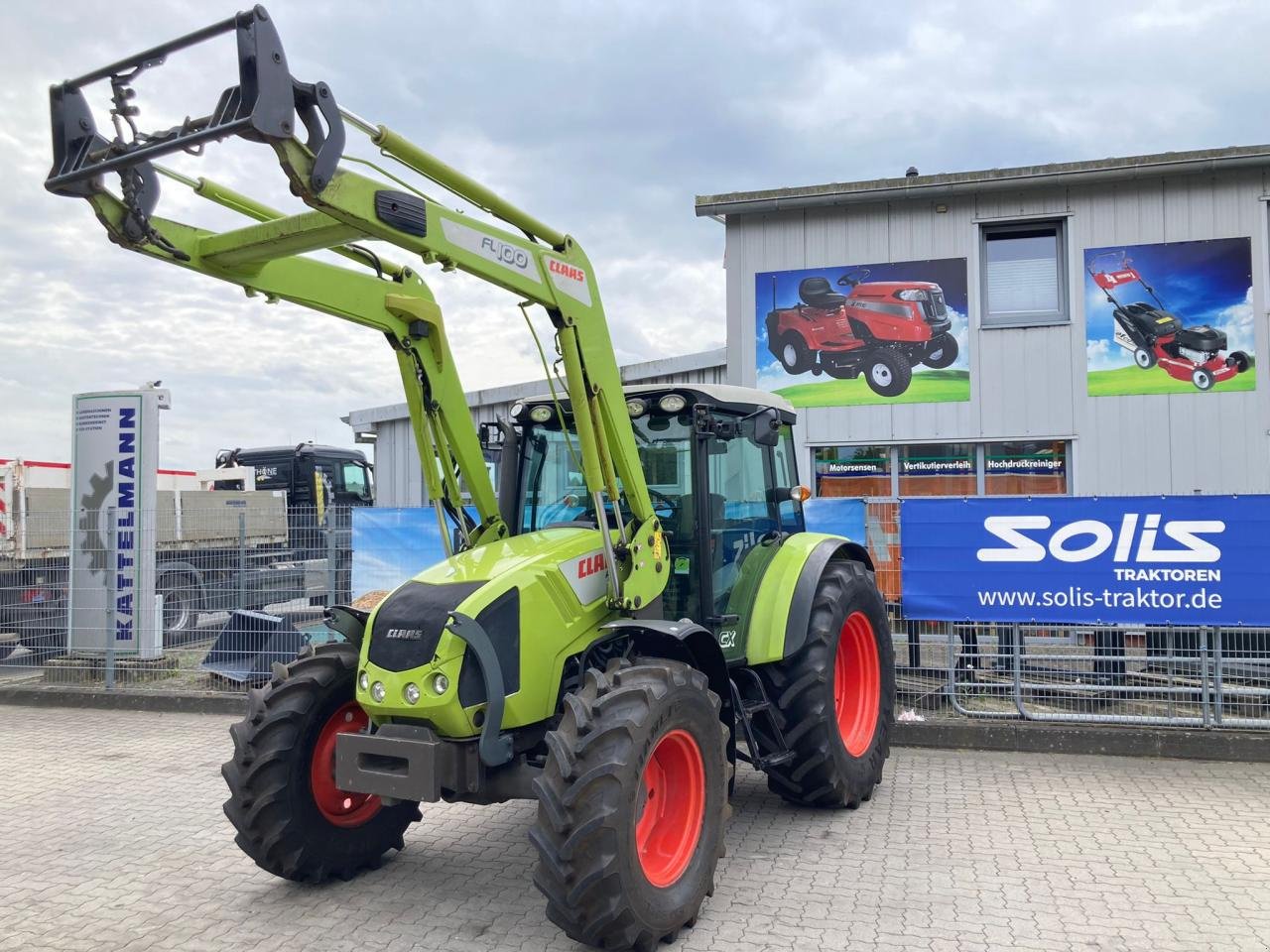 Traktor des Typs CLAAS Axos 330 CX, Gebrauchtmaschine in Stuhr (Bild 1)