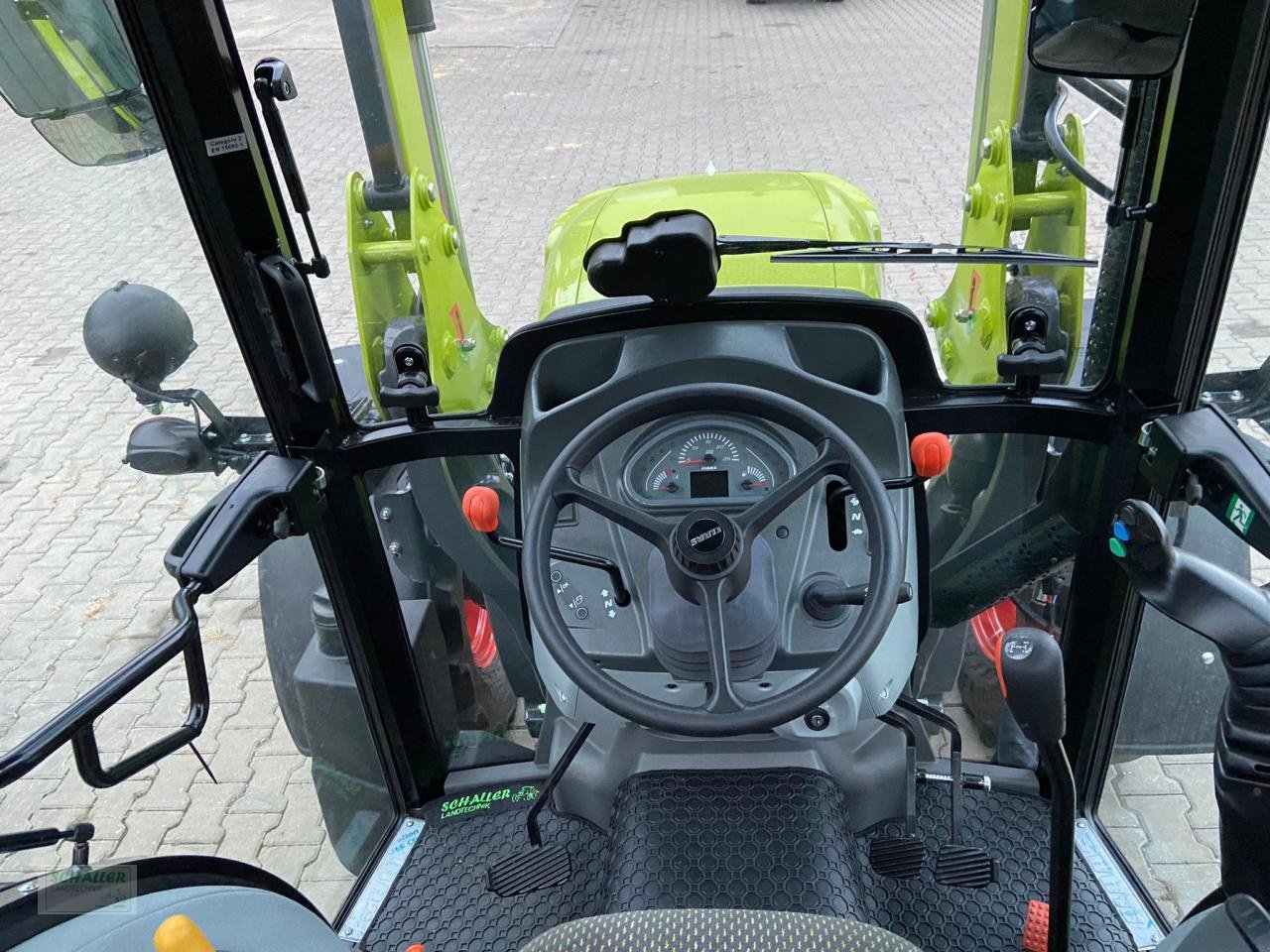Traktor van het type CLAAS ELIOS 210 Classic mit Frontlader FL60e, Beifahrersitz optional, Neumaschine in Geiselhöring (Foto 16)