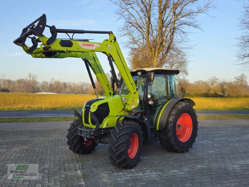 Traktor of the type CLAAS Elios 210, Neumaschine in Rhede / Brual (Picture 1)