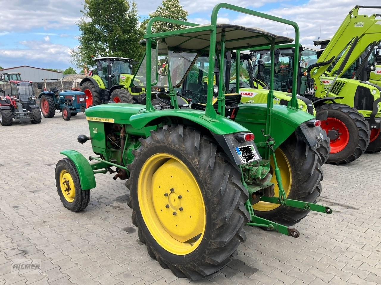 Traktor типа John Deere 310, Gebrauchtmaschine в Moringen (Фотография 3)