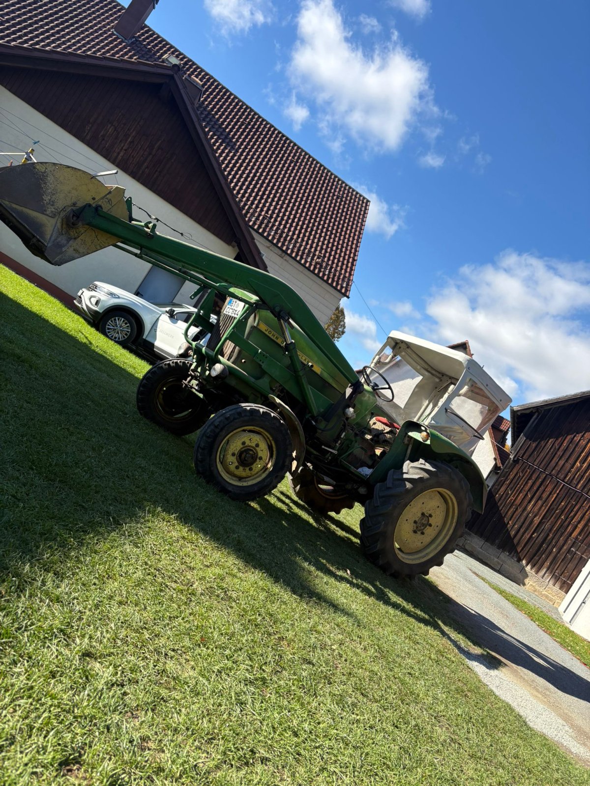 Traktor типа John Deere 310, Gebrauchtmaschine в Bindlach (Фотография 1)