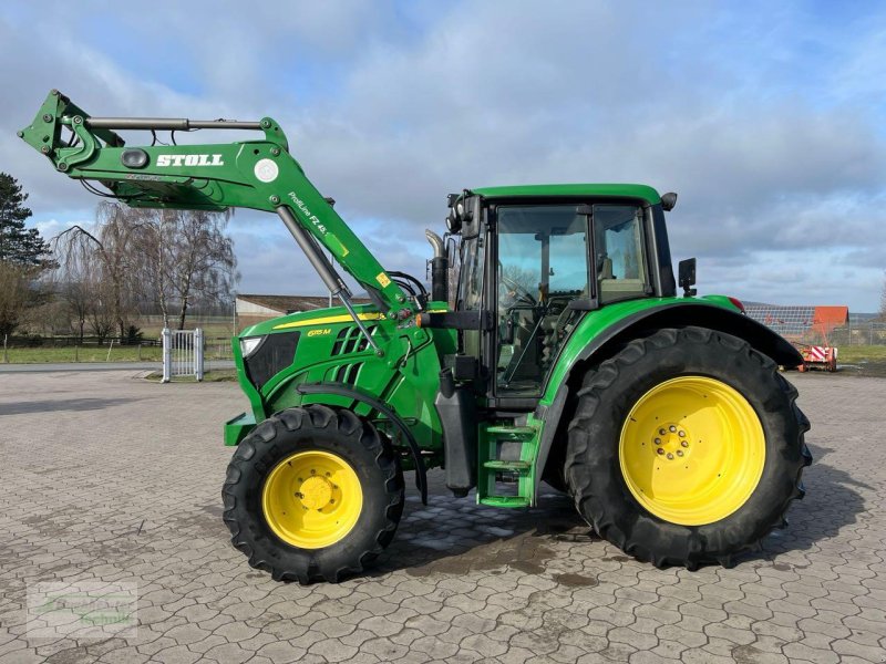 Traktor типа John Deere 6115 M, Gebrauchtmaschine в Coppenbruegge