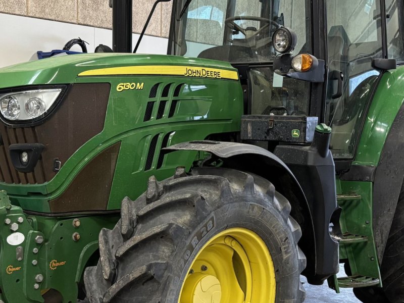 Traktor za tip John Deere 6130M Med frontlift, Gebrauchtmaschine u Lintrup