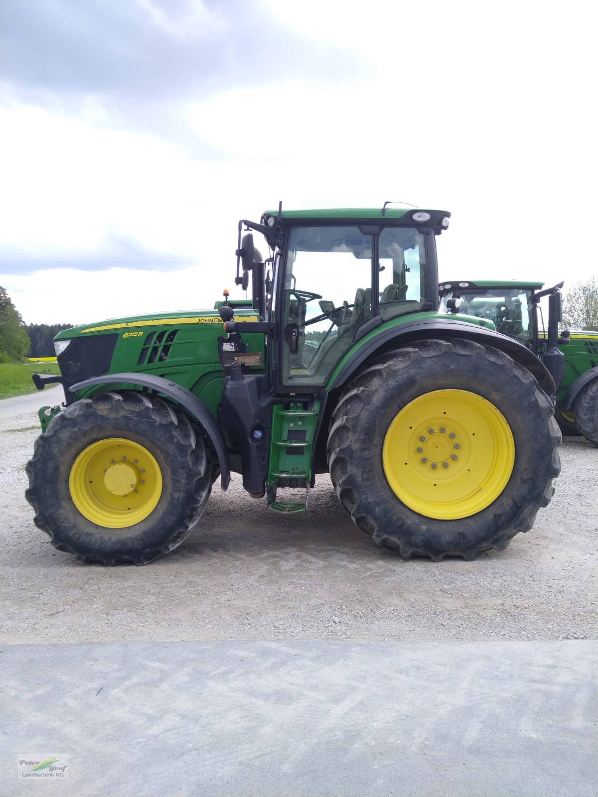 Traktor типа John Deere 6215R, Gebrauchtmaschine в Pegnitz-Bronn (Фотография 1)