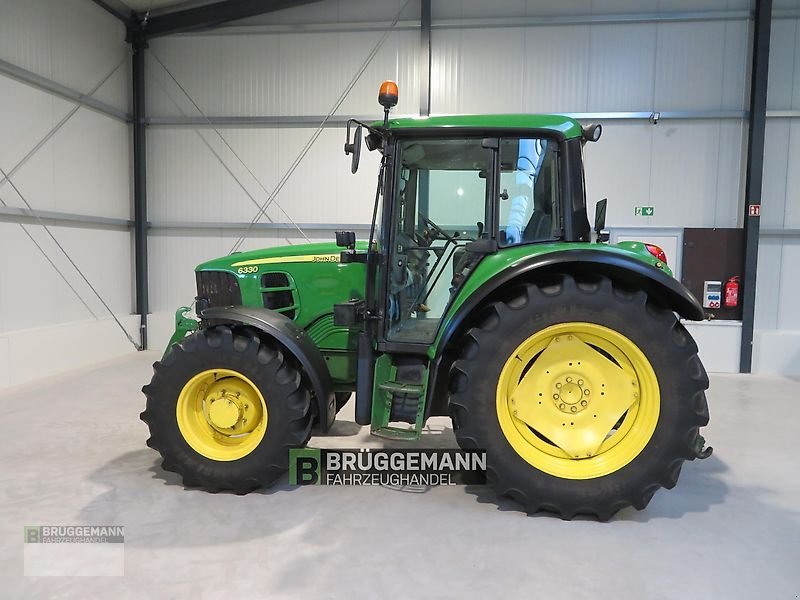 Traktor typu John Deere 6330 mit DL+Klima, Gebrauchtmaschine v Meppen (Obrázek 1)
