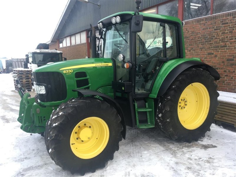 Buy John Deere 6330 PowrQuad mit Frontlader secondhand and new
