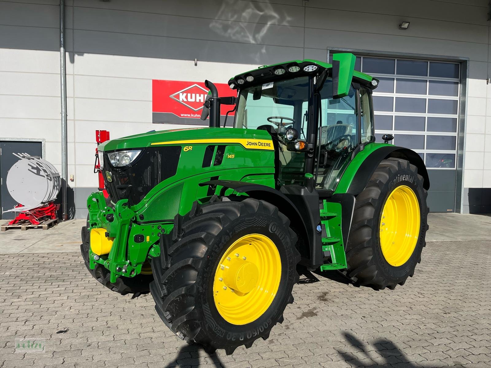 Traktor tipa John Deere 6R 145, Neumaschine u Bruckmühl (Slika 1)