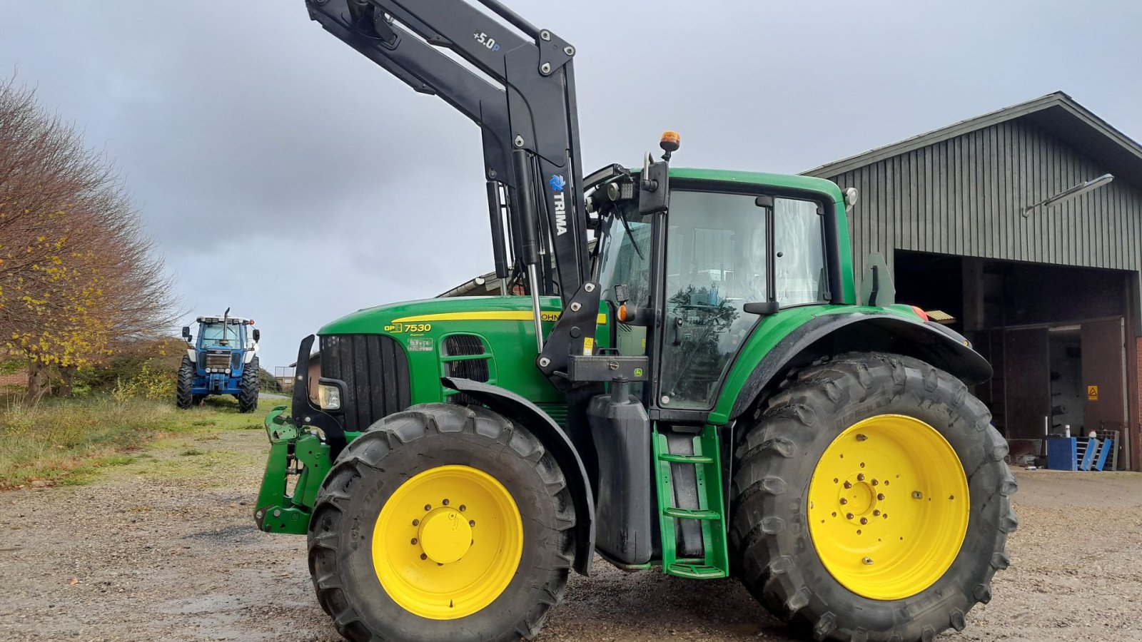 Traktor of the type John Deere 7530 Præmium Plus Auto Quard med Trima frontlæsser og frontlift Auto Quard, Gebrauchtmaschine in Skive (Picture 1)