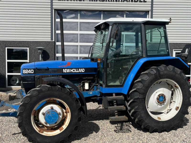 Traktor typu New Holland 8240 SLE  Med frontlift og frontPTO, Gebrauchtmaschine v Lintrup (Obrázek 1)