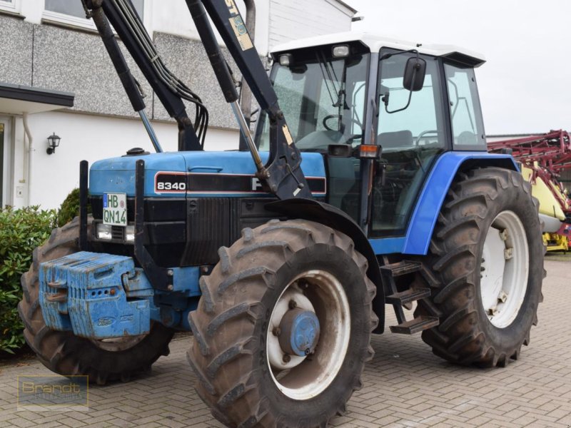 Traktor of the type New Holland 8340, Gebrauchtmaschine in Oyten (Picture 1)