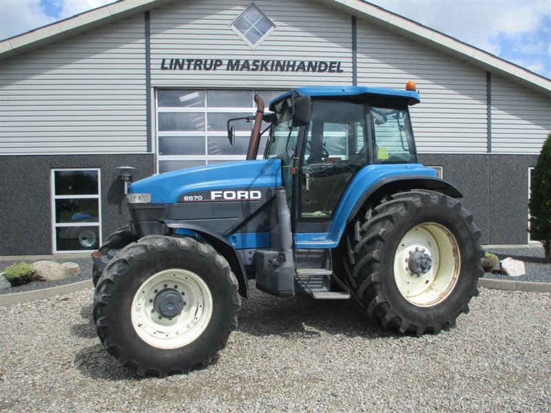 Traktor of the type New Holland 8670, Gebrauchtmaschine in Lintrup (Picture 1)