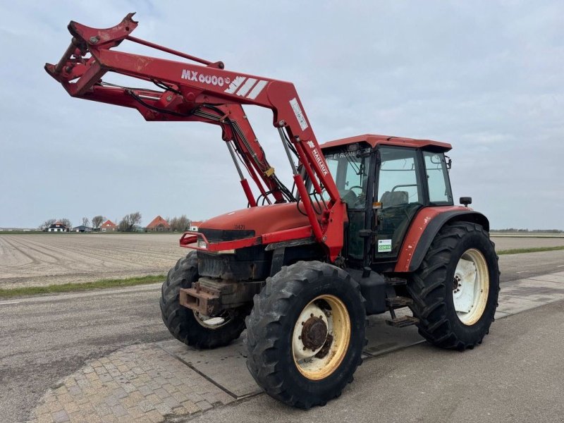 Traktor типа New Holland M100, Gebrauchtmaschine в Callantsoog