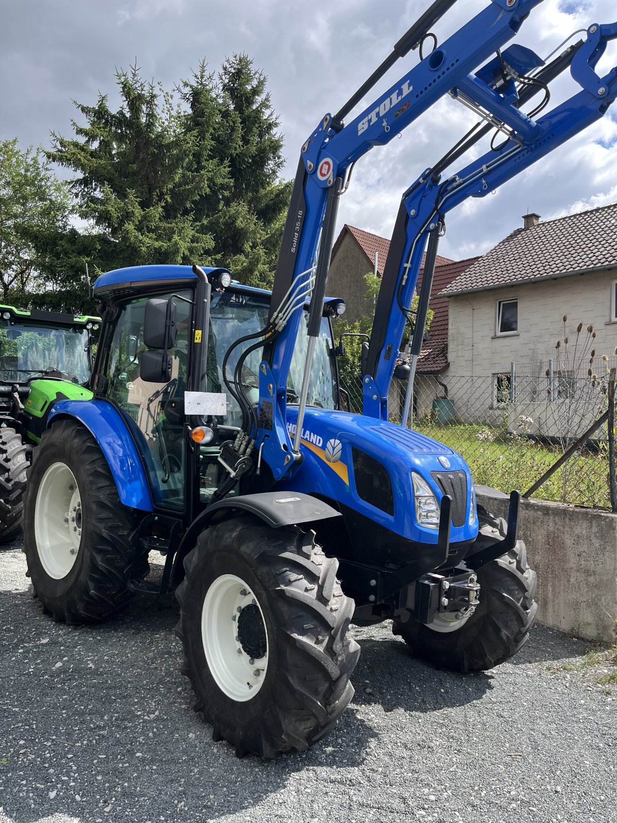 Traktor van het type New Holland T4.65, Gebrauchtmaschine in Hagenbüchach (Foto 6)